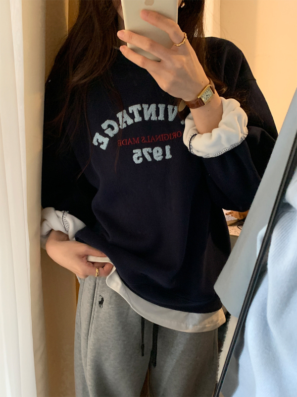 Női kapucnis pulóver, kötött pamut anyag, laza szabás, középhosszú, szöveges hímzés