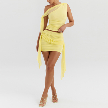 Ženski dvodijelni set: top bez rukava i plisirana kratka suknja s mrežastim detaljem, od poliestera