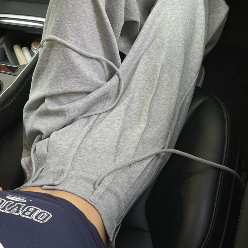 Ženske široke sportske hlače, visoki struk, ravni kroj, do poda, s vezicom u struku (Poliester 90–95%, Drugo <30%, Vezica u struku, Duljina do poda, Proljeće 2025)