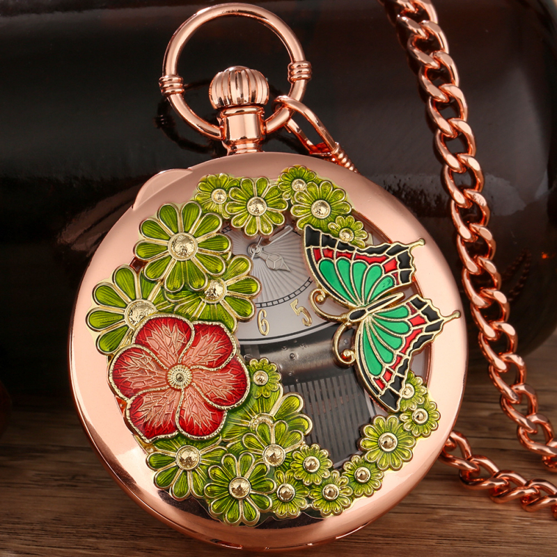 Kvarca muzikālais kabatas pulkstenis ar izgrieztiem ziedu un tauriņu motīviem, pasaules laiks, 58 mm skaitītāja diametrs, cinka sakares korpuss