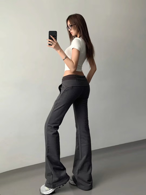 Ženske hlače casual od poliestera, blago proširene dolje, niska struka, mikro-elastične, glavni sadržaj tkanine 30–50%