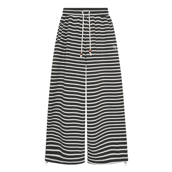 Naiste püksid vabalt lõikega, keskmine talje, polüesterkangas, mikroelastsus