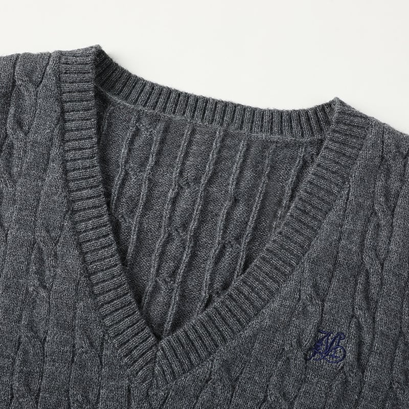 Ženska pletene veste s V izrezom, slobodan kroj, poliester, duljina 50–65 cm, proljeće 2025, elegantan gradski stil.