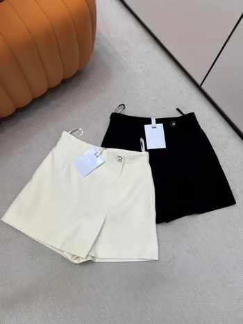 A-linijski vuneni skort s asimetričnim rubom, 70–80% vune, proljeće 2025, gradski stil svakodnevnog putovanja