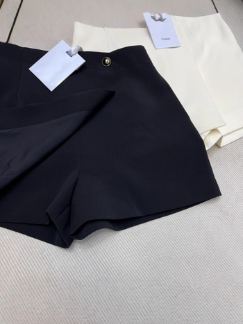 A-linijski vuneni skort s asimetričnim rubom, 70–80% vune, proljeće 2025, gradski stil svakodnevnog putovanja