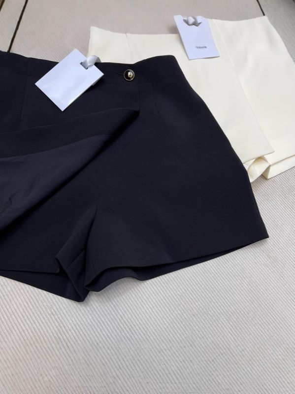 A-linijski vuneni skort s asimetričnim rubom, 70–80% vune, proljeće 2025, gradski stil svakodnevnog putovanja