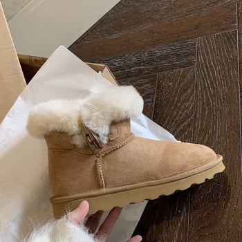 Női hócsizma - felső része szőrrel bevonva, rövid szár, csúszásmentes gumírozott talp, plüss belső bélés