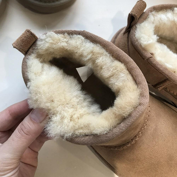 Cizme de zăpadă din piele de capră cu blană integrată, căptușite cu lână, talpă din cauciuc, guler scurt, vârf rotund