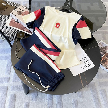 Divdaļīgs kokvilnas un poliestera sporta komplekts ar 3/4 garuma piedurknēm un platām biksēm, vasara 2024