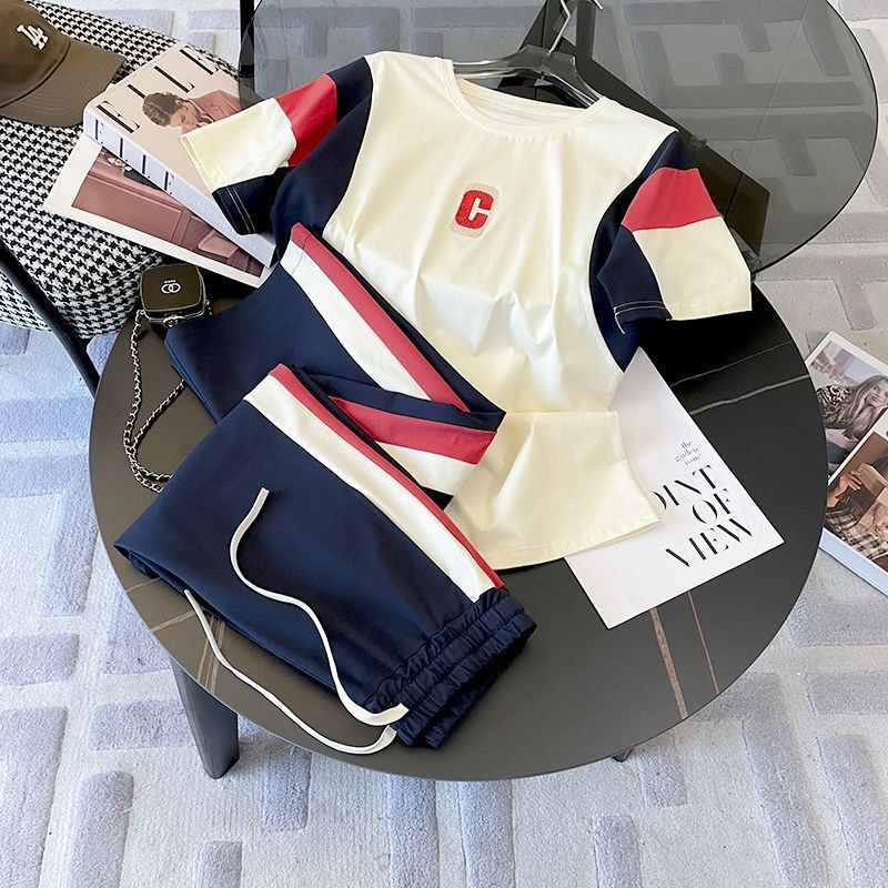 Divdaļīgs kokvilnas un poliestera sporta komplekts ar 3/4 garuma piedurknēm un platām biksēm, vasara 2024