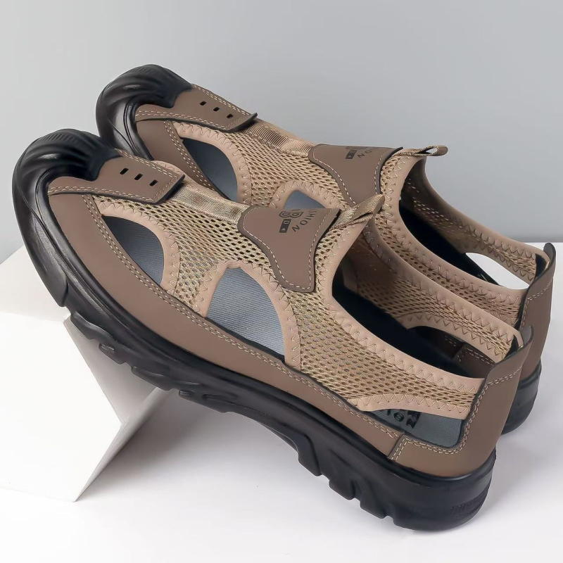 Vīriešu pludmales sandales – elpojošs tīkla augšējais materiāls, ūdensnecaurlaidīgas, pretslīdējoša PVC zole ar injekcijas formu, papēža augstums 2–3 cm