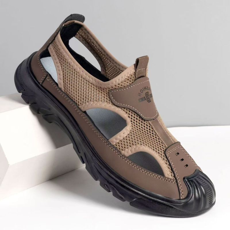 Vīriešu pludmales sandales – elpojošs tīkla augšējais materiāls, ūdensnecaurlaidīgas, pretslīdējoša PVC zole ar injekcijas formu, papēža augstums 2–3 cm