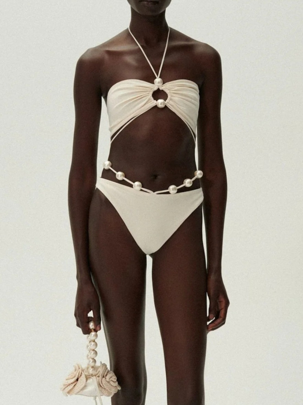 Ženski dvodijelni bikini, bez rukava, visokou elastičan najlon materijal (80% najlon / 20% elastan), podstava od poliestera (95% poliestera, 5% elastana), s umetkom za prsa, pogodno za plivanje