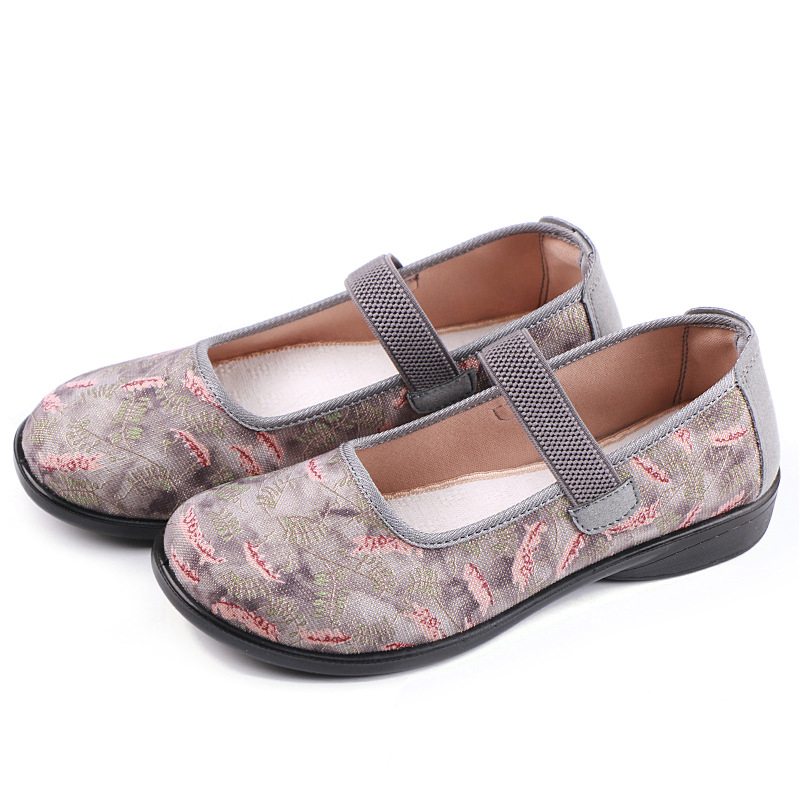 Sieviešu ikdienas auduma kurpes ar ziedu rakstu – elpojošas, vieglas, izturīgas; augšdaļa audums, zole poliuretāns, iekšējais audums kokvilna, sekla atvere, apaļš purns, plakana papēdis