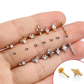 Csillag alakú ajak- és fülcsipessz 316L rozsdamentes acélból, cirkónium kristályokkal, elektroplattázott bevonattal