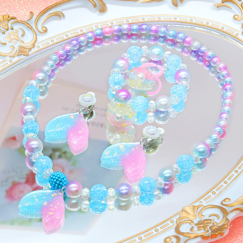 Комплект детски бижута: огърлица, пръстен и обеци с ракушка и опашка на русалка; материал пластмаса/смола; за деца; възраст 3–6, 6–10 и над 10 години; стартира пролет 2024