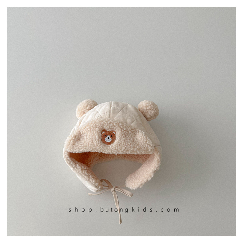 Vunena kapa s flecom za uši, kupolni kroj, topla i otporna na vjetar; za dob 6–12 mjeseci, 1–2 godine i 2–4 godine