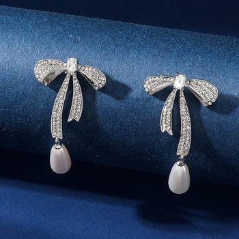Ogrlica s rhinestones mašnicom i perlom, lanac od legure, dijamantni završetak, set s naušnicama