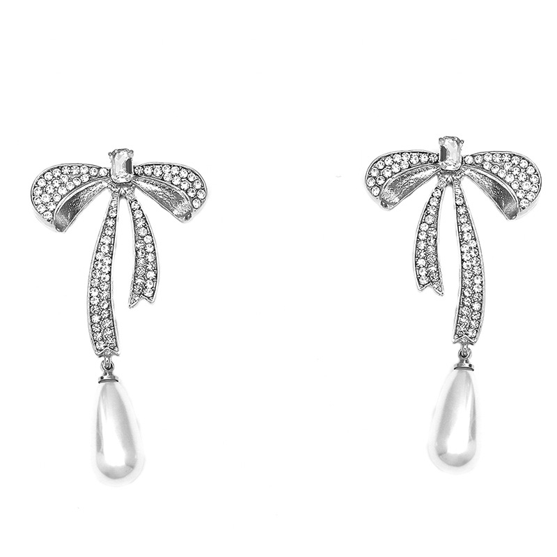 Ogrlica s rhinestones mašnicom i perlom, lanac od legure, dijamantni završetak, set s naušnicama