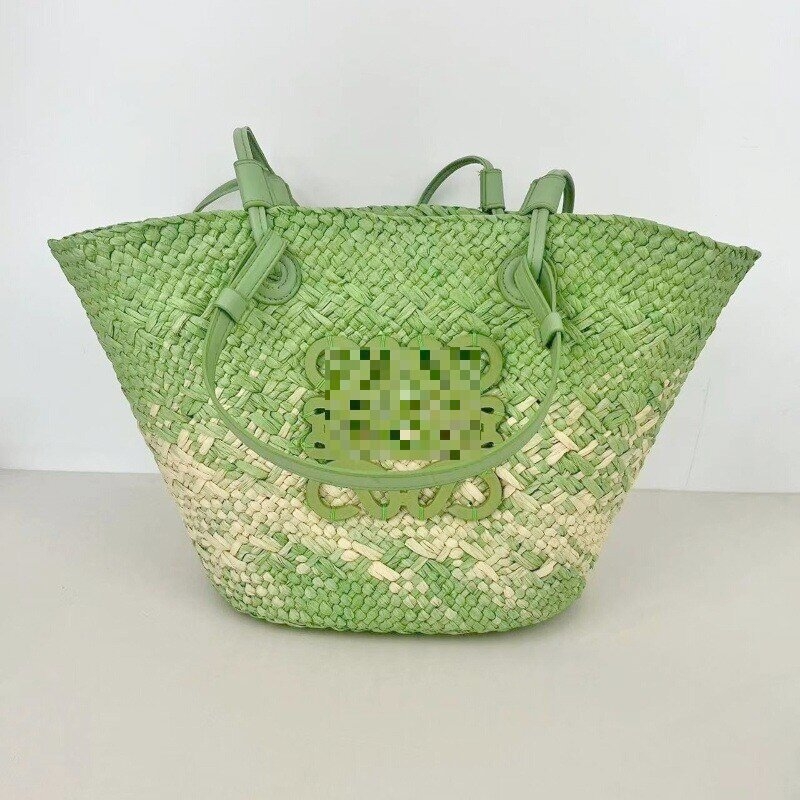 Válltáska papírral szőtt anyagból, városi letisztult stílus, dumpling alakú, nyitott tetejű, belső zseb a mobiltelefon számára