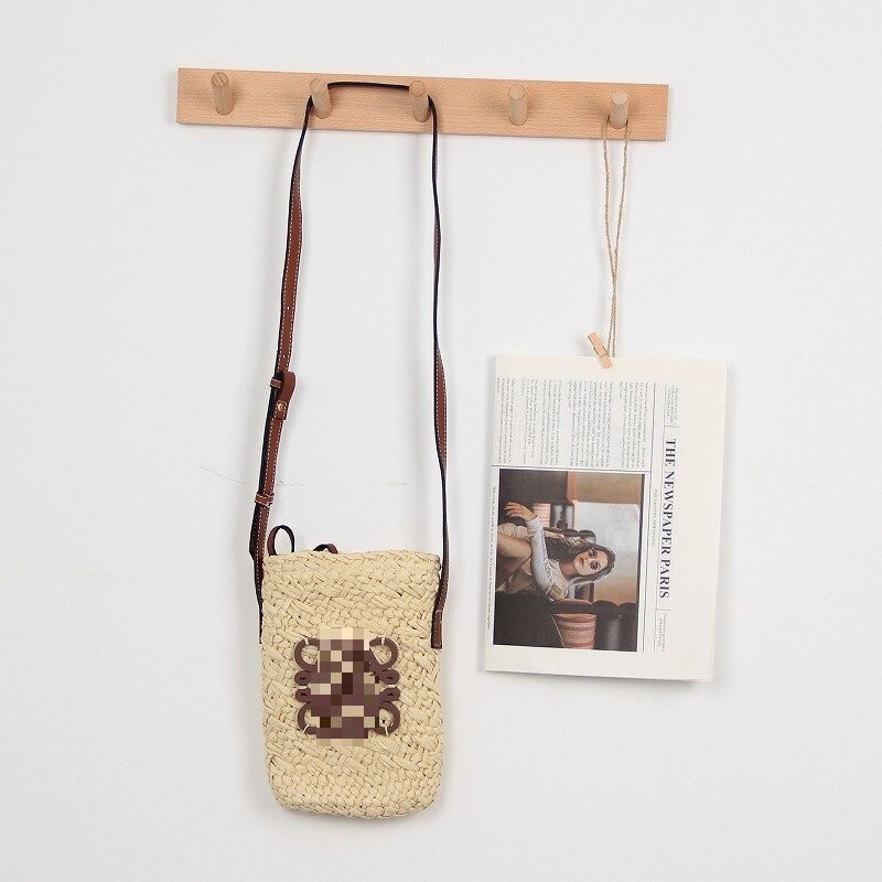 Válltáska papírral szőtt anyagból, városi letisztult stílus, dumpling alakú, nyitott tetejű, belső zseb a mobiltelefon számára