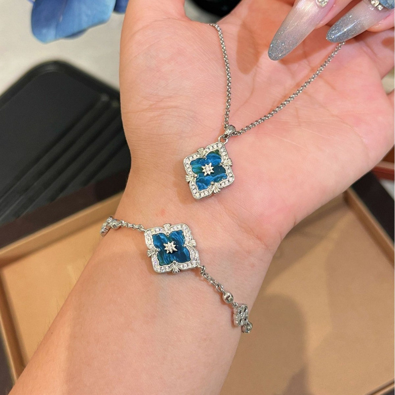 Plavi fosforitni set nakita s motivom četverolistne djeteline – ogrlica, narukvica i naušnice, cvjetni vintage stil