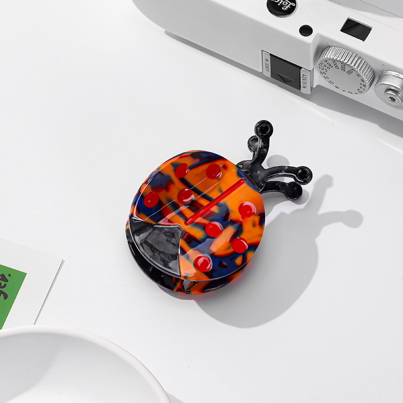 Zanbeiya Fogó hajcsipesz – Karikatúra rovar motívum, kézi készítésű, anyag: ecetsav, nőknek