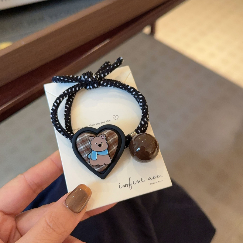 Tüdrukutele mõeldud juukseband karu ruudulise motiiviga, sobib pundile või kuklale, elastne ja lihtne; Materjal: Segus; Töötlemise tehnoloogia: teemant; Bränd: Nothing; Sezona: 2025 sügis