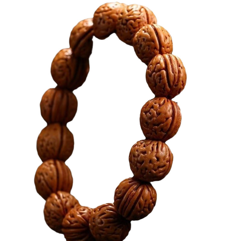 Гривна от дърво с прасковено ядро, етно стил, унисекс, електроплатирана