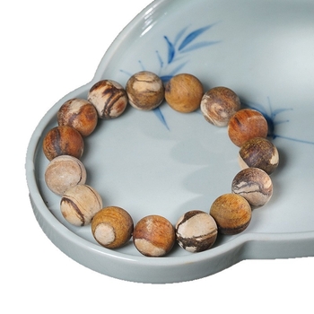 Feather márkájú buddhista gyöngyökkel készült karkötő Tribute fából, modern minimalist stílus, polírozott kivitel