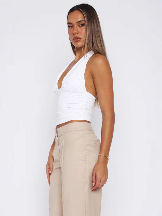Kamisol s halter ovratnikom i dubokim V izrezom, uski kroj, poliester (95%+), duljina 50–65 cm