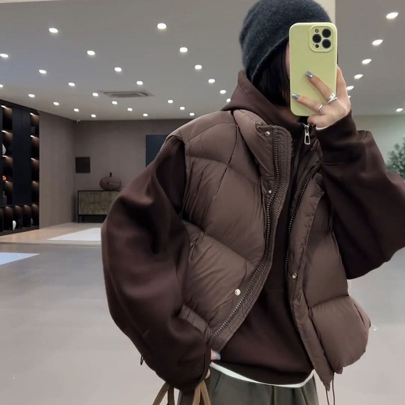 Ženski prsluk od perja i pamuka, stojeći ovratnik, ležerni kroj, kratka silueta, zima 2025