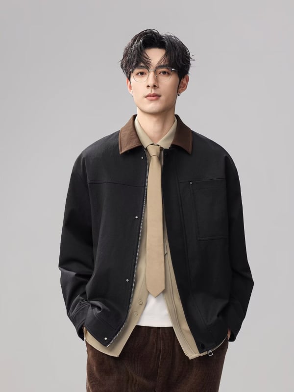 Jakna od pamuka s poliesterom; zatvarač; rever; labav kroj; bočni džepovi