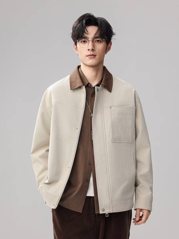 Jakna od pamuka s poliesterom; zatvarač; rever; labav kroj; bočni džepovi