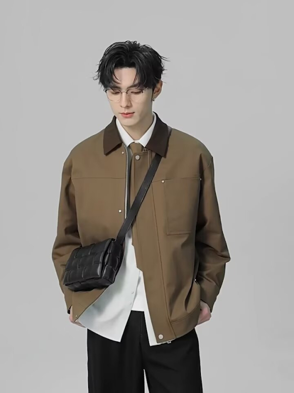 Jakna od pamuka s poliesterom; zatvarač; rever; labav kroj; bočni džepovi