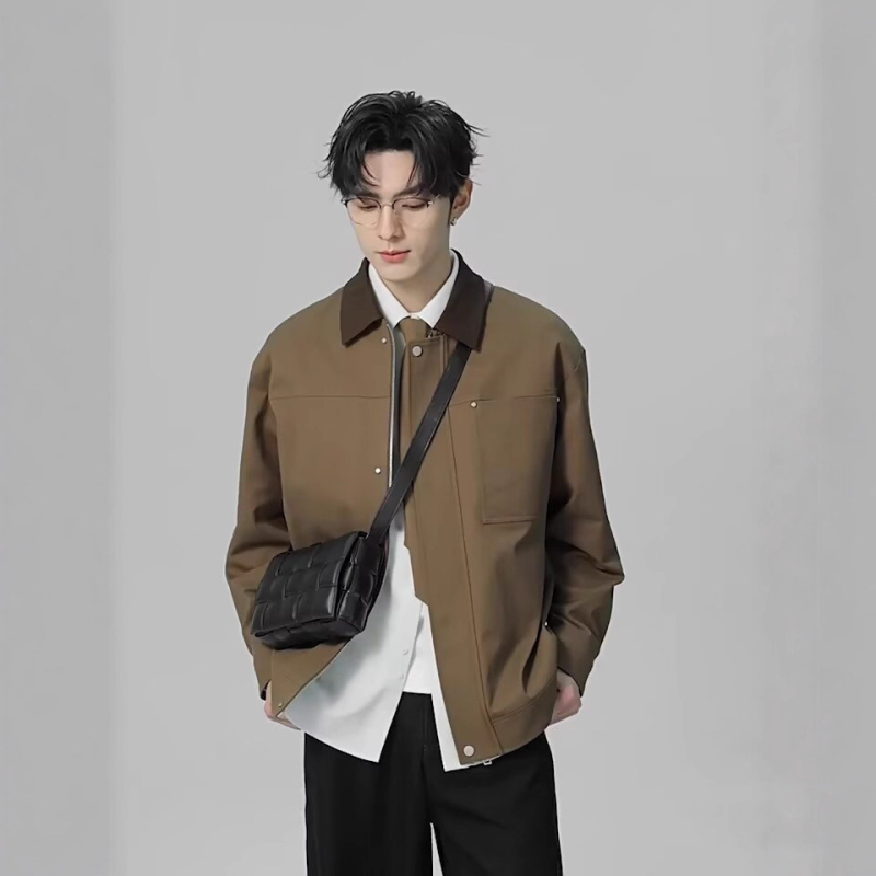 Jakna od pamuka s poliesterom; zatvarač; rever; labav kroj; bočni džepovi