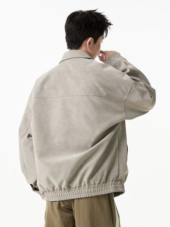 Kožna jakna sa stojećim ovratnikom, široka kroj, bez kapulje, detalj na zipu, bočni džepovi – za proljeće i jesen