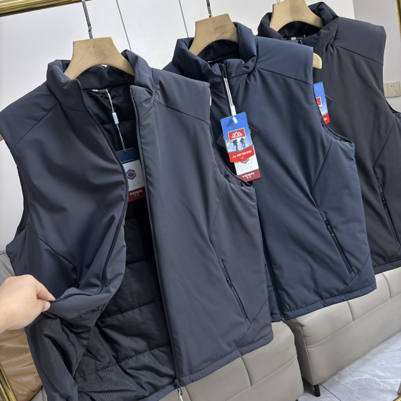 Talvine välistöö vest-jakk paksendatud soojusega, nailon 88%, seisukael, külgtaskud