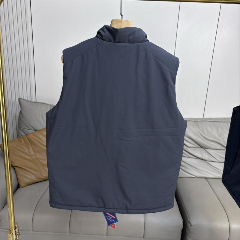 Talvine välistöö vest-jakk paksendatud soojusega, nailon 88%, seisukael, külgtaskud