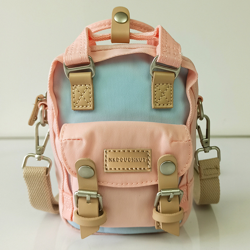 Női nylon crossbody táska, NX DOUGHNUT, mozdony stílus, függőleges négyszögletes forma, cipzár, belső zseb