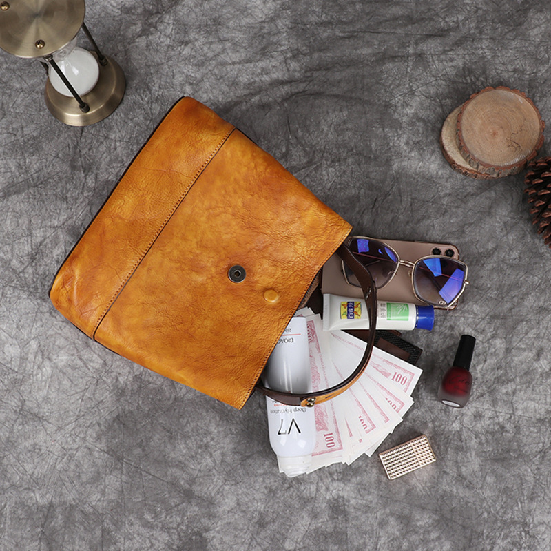 Ženska kožna crossbody torba u bucket stilu, prava koža, gornji sloj goveđe kože, zatvarač, unutarnje džepovi, branda HENGDEWEI