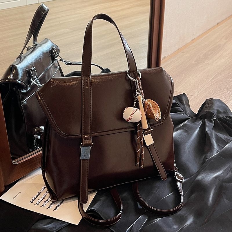 Retro ženska torbica s dvostrukom funkcijom – crossbody i ruksak, velika zapremina; materijal poliester, podstava PU, magnetska kopča, cyber-funkcionalan stil; pogodna za rekreacijska putovanja