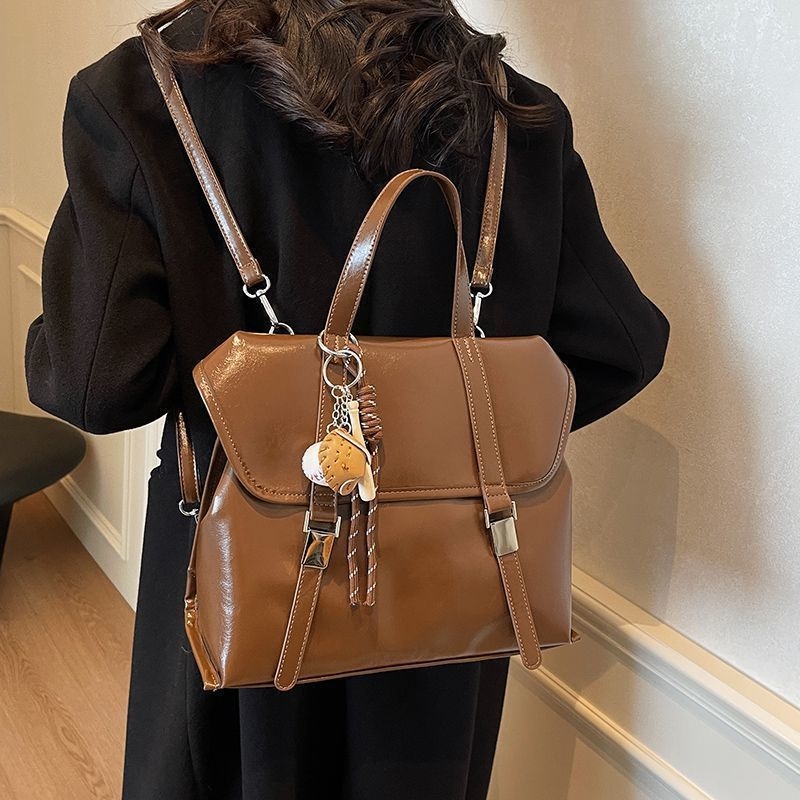 Retro ženska torbica s dvostrukom funkcijom – crossbody i ruksak, velika zapremina; materijal poliester, podstava PU, magnetska kopča, cyber-funkcionalan stil; pogodna za rekreacijska putovanja