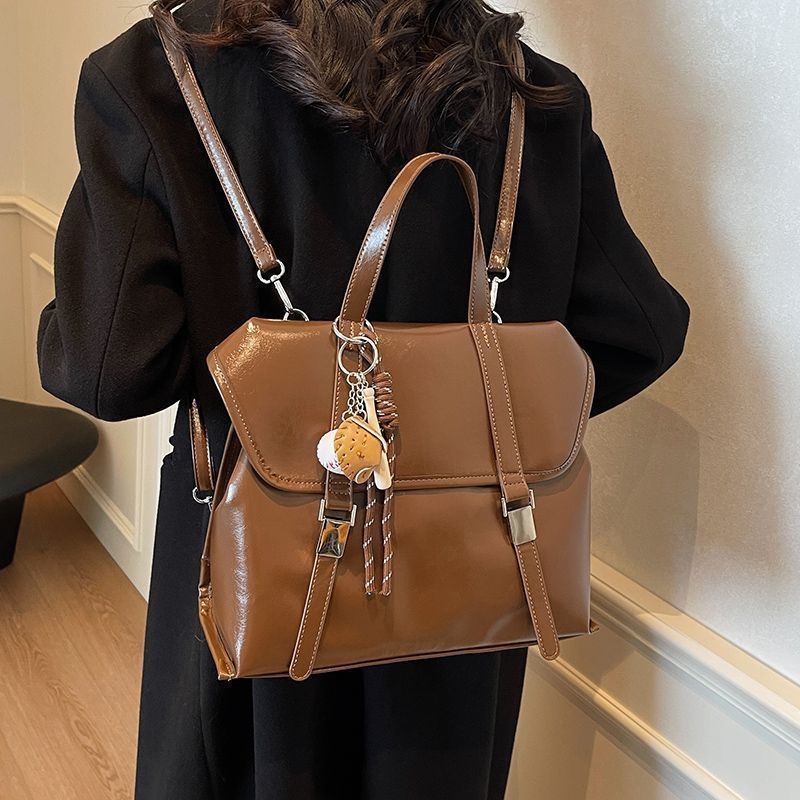 Retro ženska torbica s dvostrukom funkcijom – crossbody i ruksak, velika zapremina; materijal poliester, podstava PU, magnetska kopča, cyber-funkcionalan stil; pogodna za rekreacijska putovanja