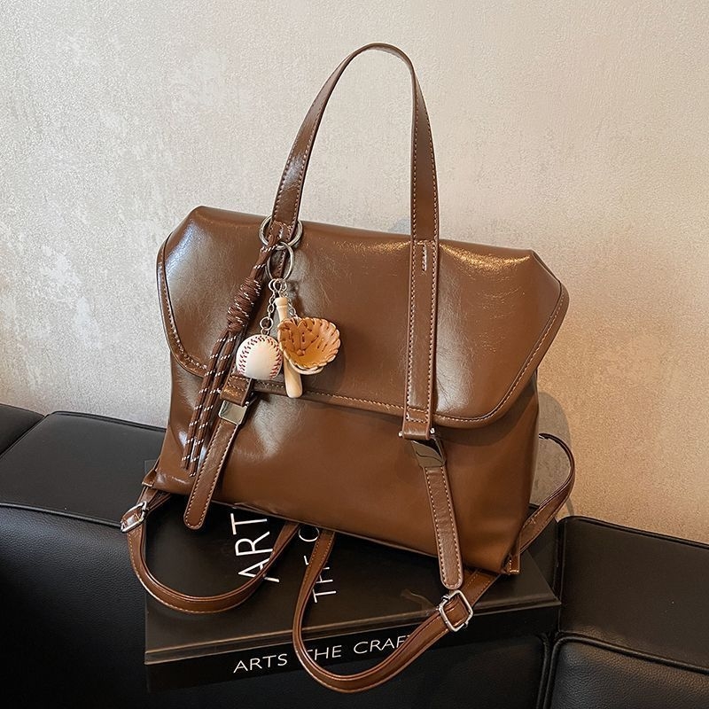 Retro ženska torbica s dvostrukom funkcijom – crossbody i ruksak, velika zapremina; materijal poliester, podstava PU, magnetska kopča, cyber-funkcionalan stil; pogodna za rekreacijska putovanja