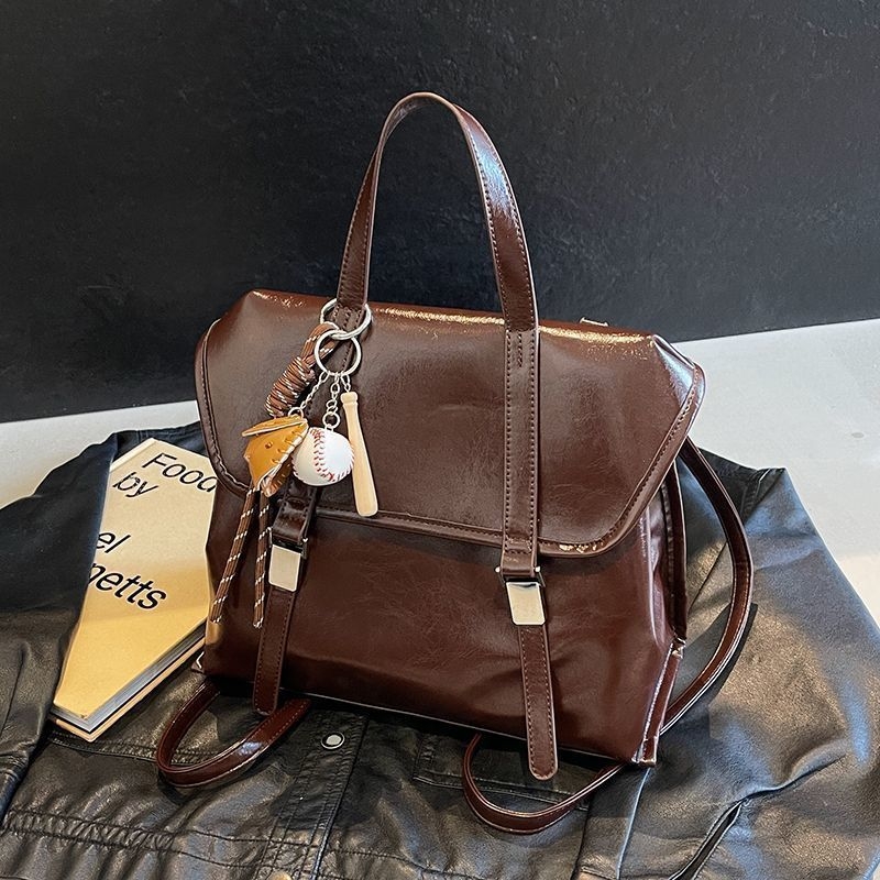 Retro ženska torbica s dvostrukom funkcijom – crossbody i ruksak, velika zapremina; materijal poliester, podstava PU, magnetska kopča, cyber-funkcionalan stil; pogodna za rekreacijska putovanja