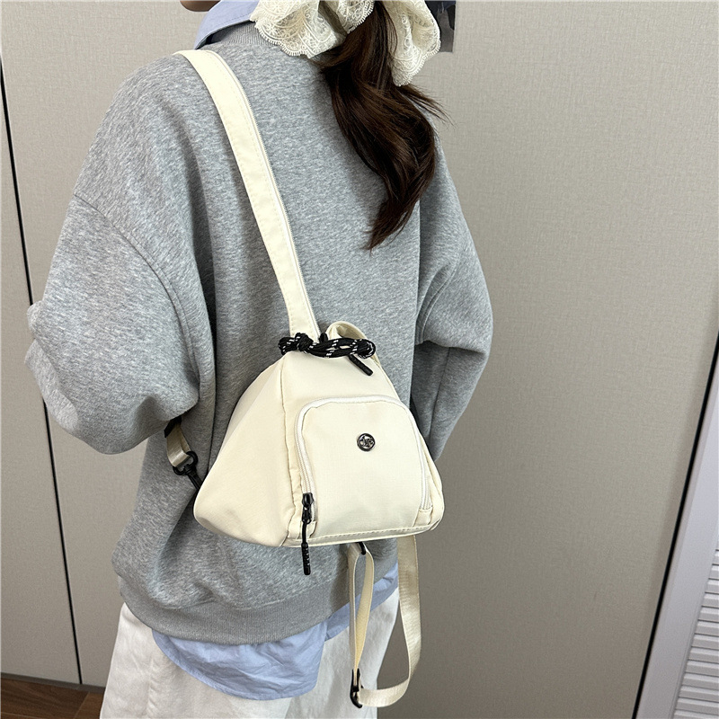 Crossbody torba - casual višenamjenska, ovalni oblik, platnen materijal, zatvaranje na zip, unutarnji pretinac