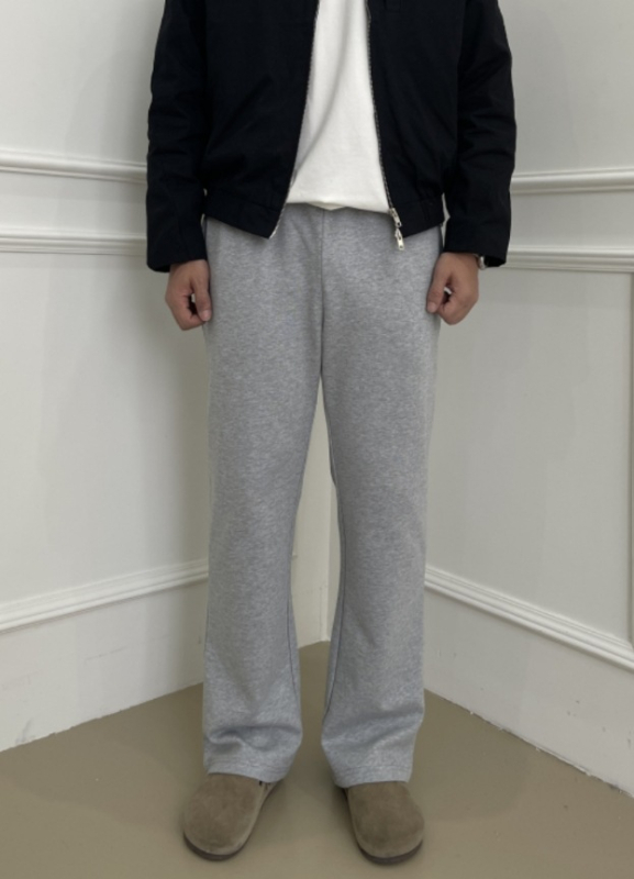 Unisex sportske hlače od pamuka s flecom iznutra, crne, slim-fit kroj, srednji pojas, vezanje šnrom, više džepova, zimska kolekcija