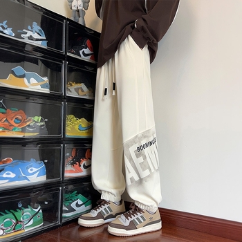 Muške fleece sportske hlače, slobodan kroj, pojas s vezicom, print s tekstom, poliester