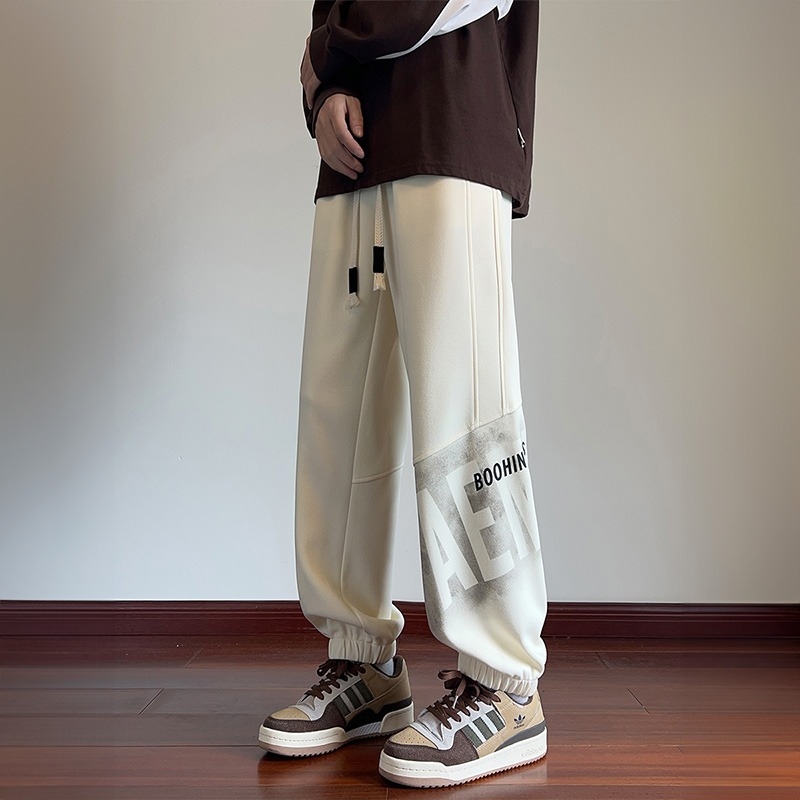 Muške fleece sportske hlače, slobodan kroj, pojas s vezicom, print s tekstom, poliester